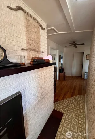 a kitchen with stainless steel appliances wooden cabinets and a counter top space