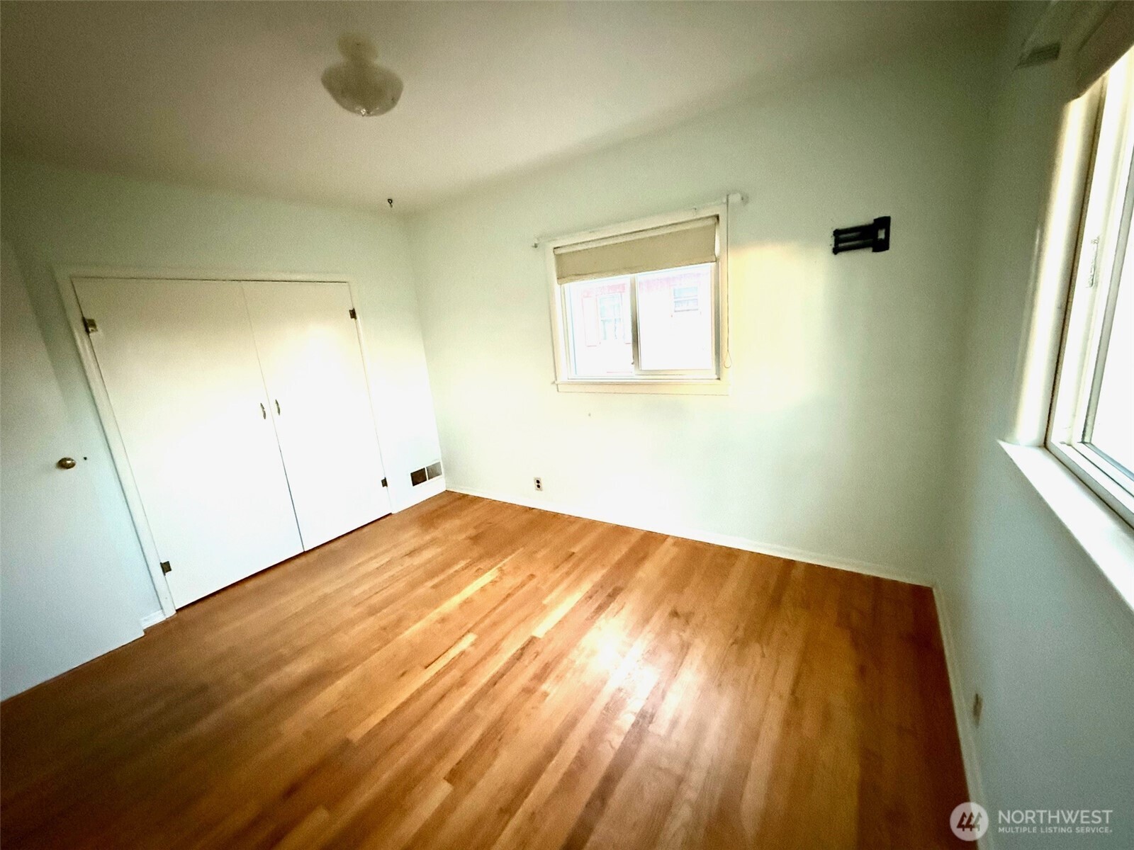 1006 East Dobson Road Odessa, WA 99159 - Photo 8 of 38 a view of empty room with wooden floor and fan