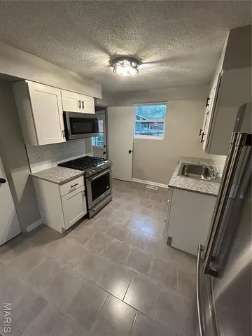 $314,900 | 8604 Red Bud Avenue, Richmond Heights, MO 63117