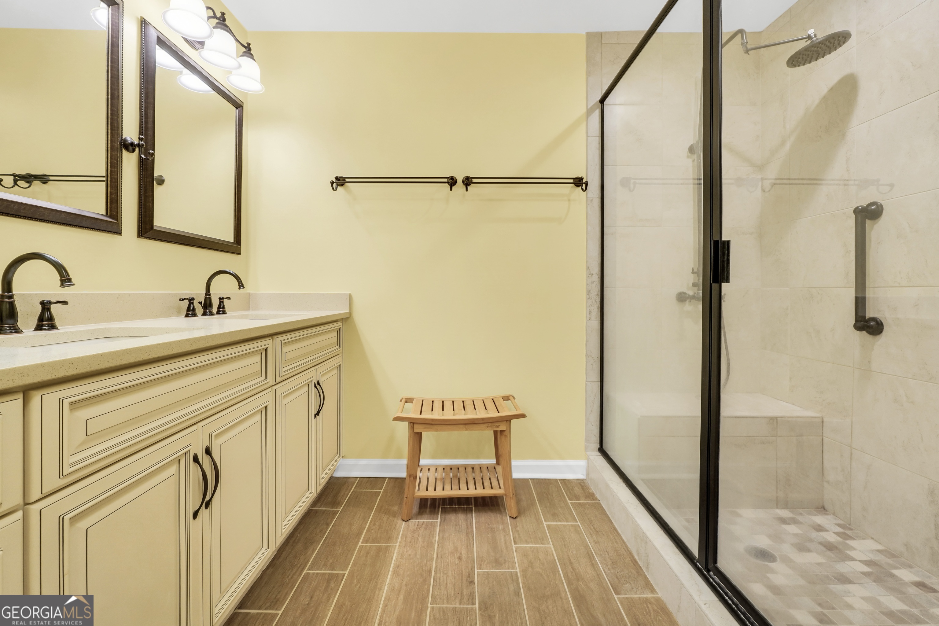 715 Concord Road Shady Dale, GA 31085 - Photo 27 of 38 a bathroom with a sink and a mirror