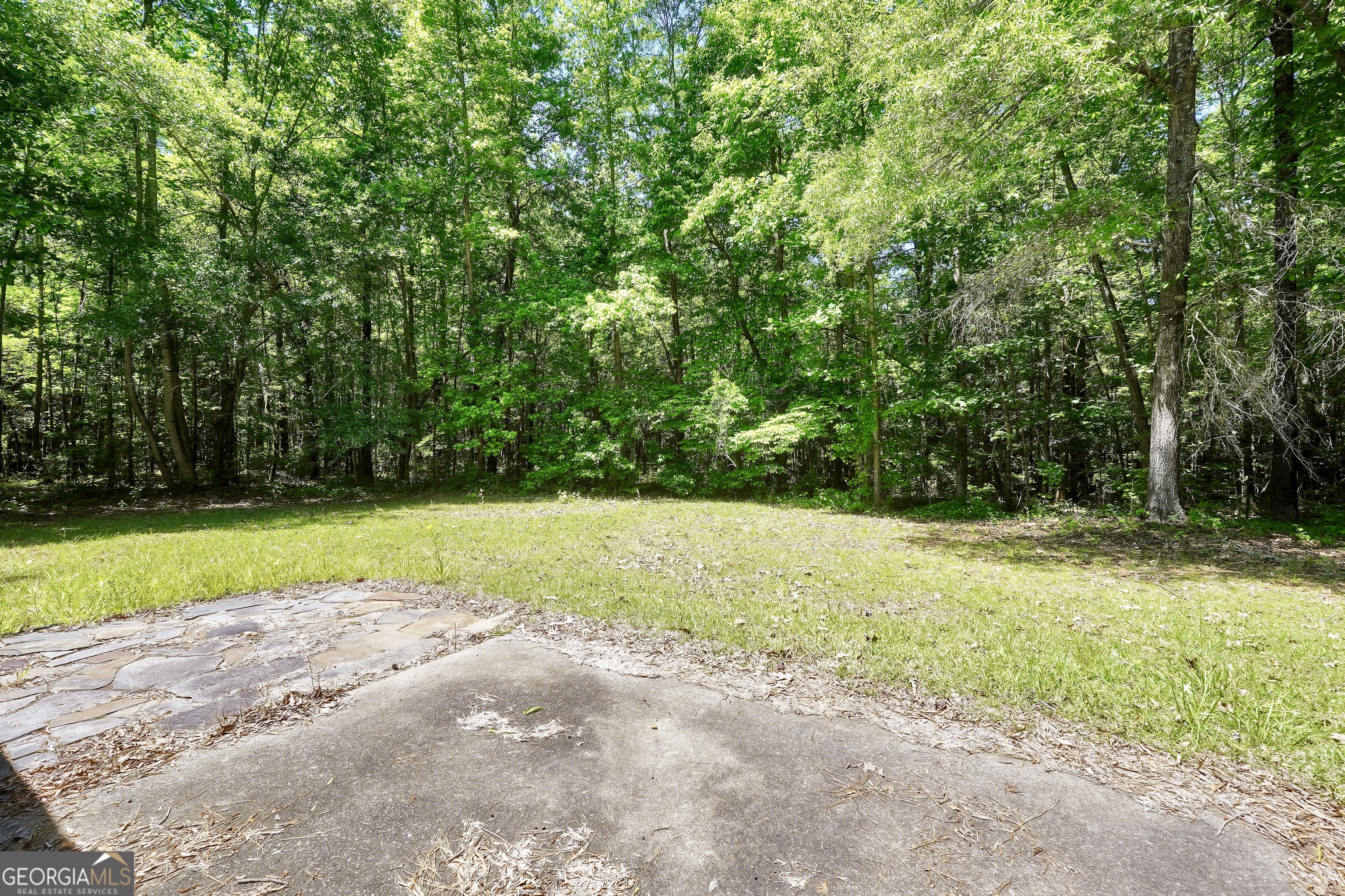 715 Concord Road Shady Dale, GA 31085 - Photo 34 of 38 a view of outdoor space with deck and yard