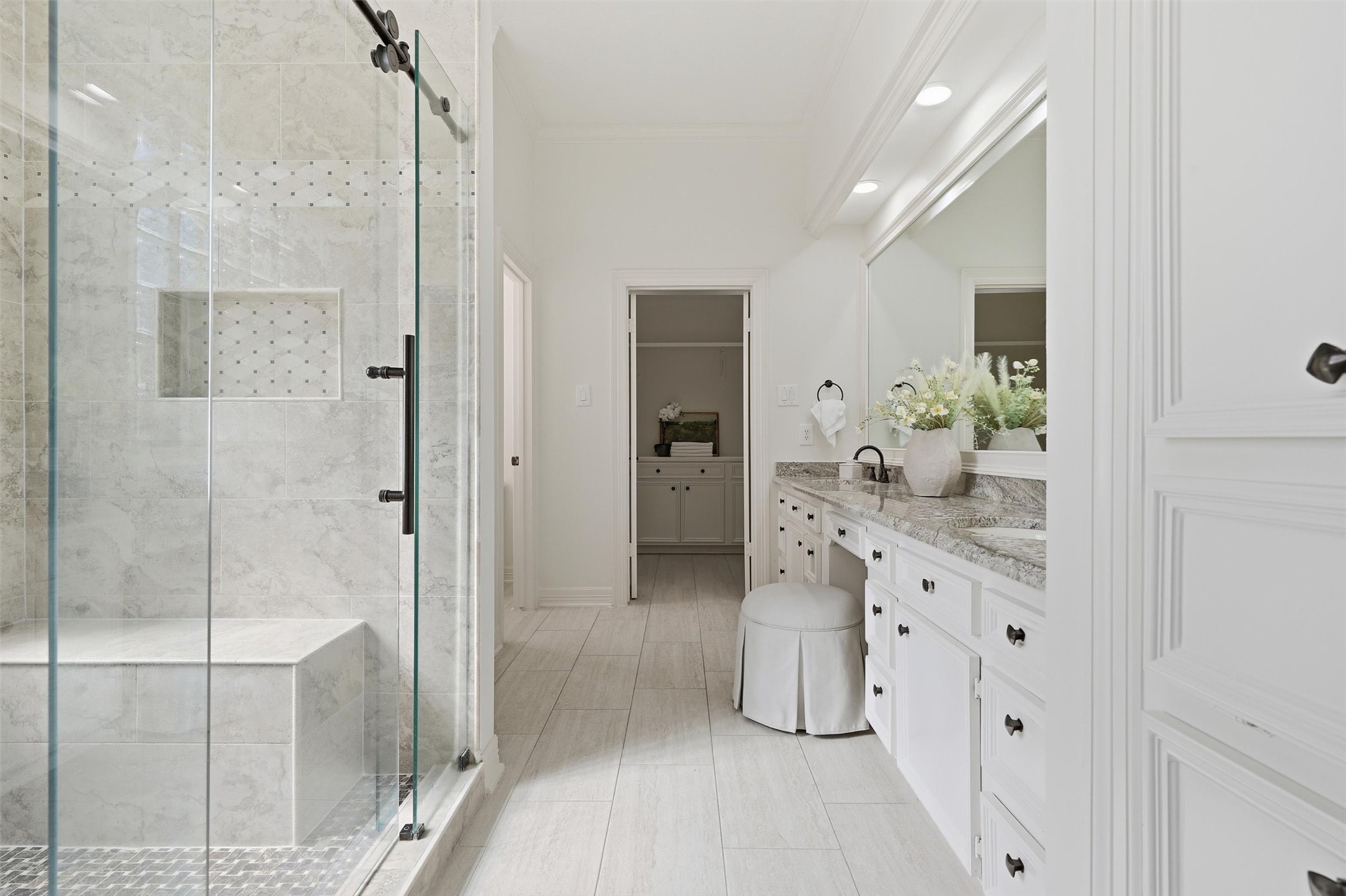 1918 Winter Knoll Way Houston, TX 77062 - Photo 23 of 46 Spacious primary bath featuring a walk-in shower and double sinks, designed for comfort and convenience.