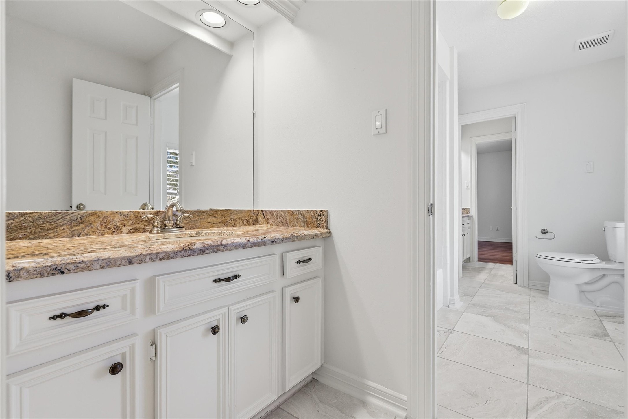 1918 Winter Knoll Way Houston, TX 77062 - Photo 38 of 46 Jack & Jill bath with separate sinks for each connected bedroom.