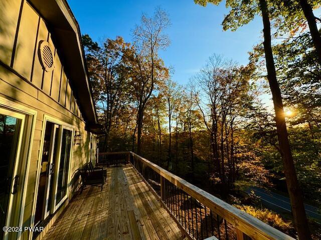 3067 Northgate Road Lake Ariel, PA 18436 - Photo 5 of 79 a view of balcony with wooden floor and trees