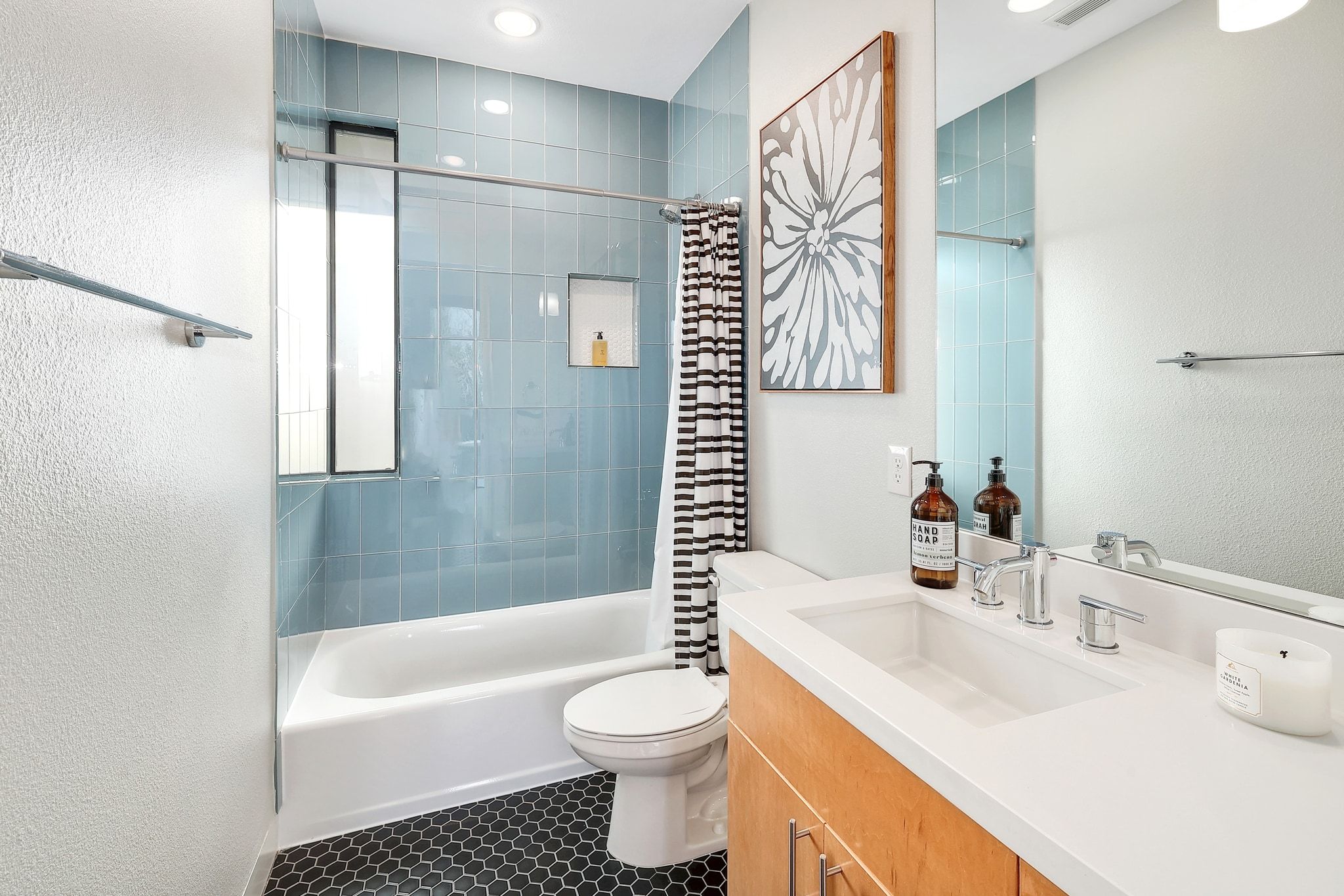 5710 Longhorn Landing Austin, TX 78734 - Photo 18 of 37 a bathroom with a sink toilet and shower