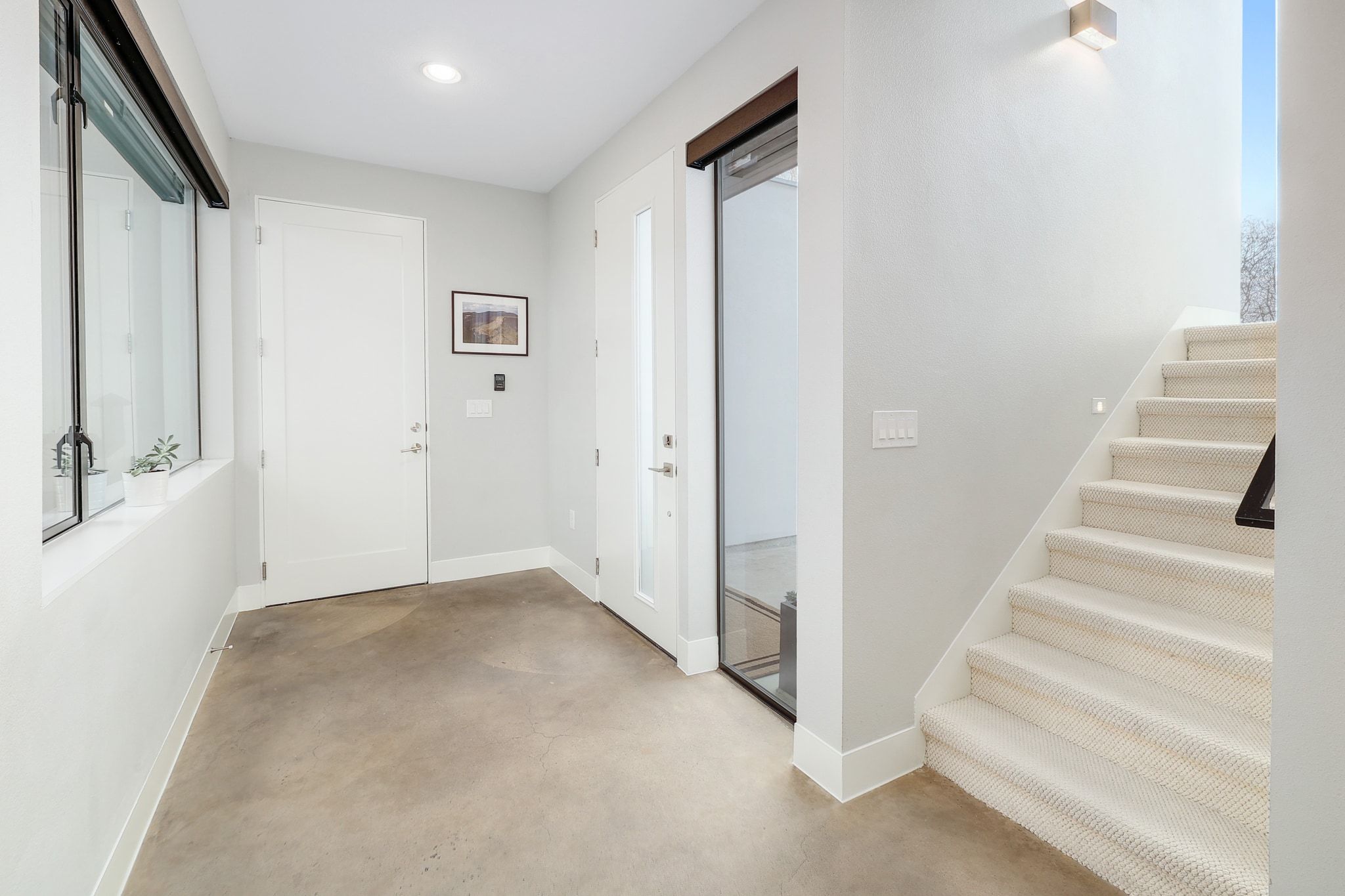 5710 Longhorn Landing Austin, TX 78734 - Photo 19 of 37 a view of an entryway with staircase