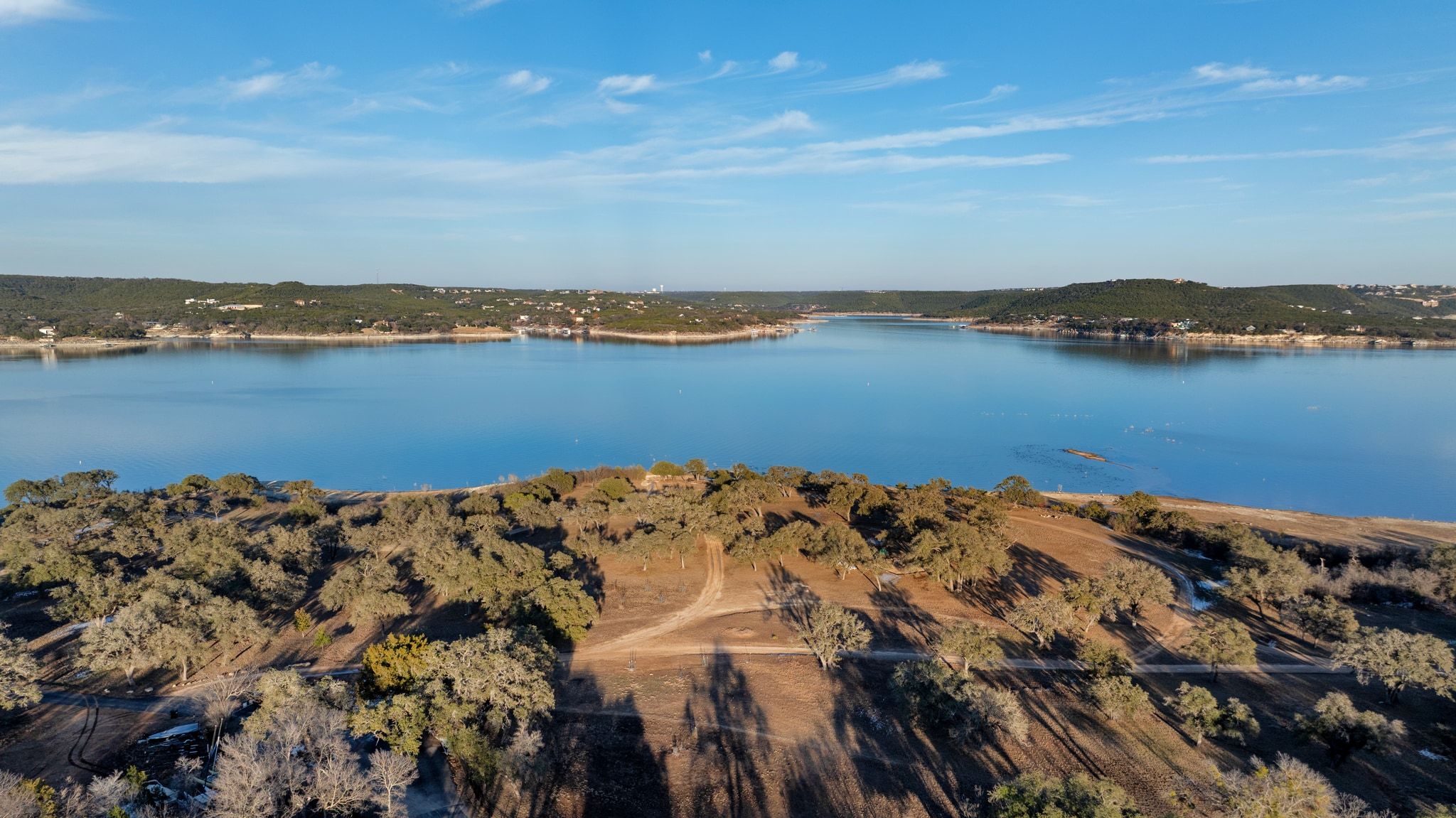 5710 Longhorn Landing Austin, TX 78734 - Photo 32 of 37 a view of a large body of water with a mountain in the background