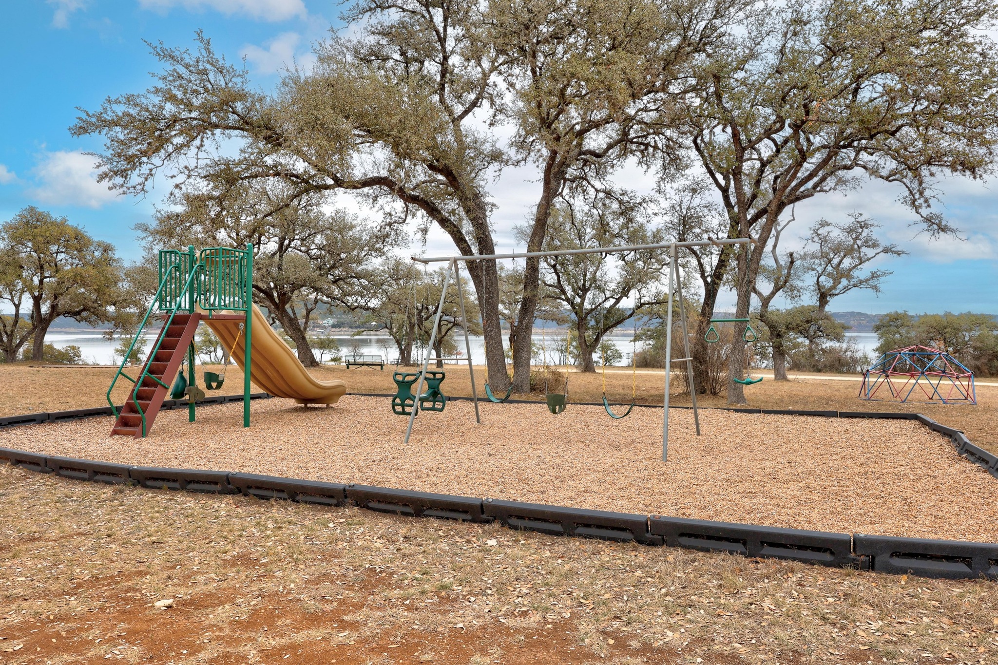 5710 Longhorn Landing Austin, TX 78734 - Photo 35 of 37 a view of a park with slide