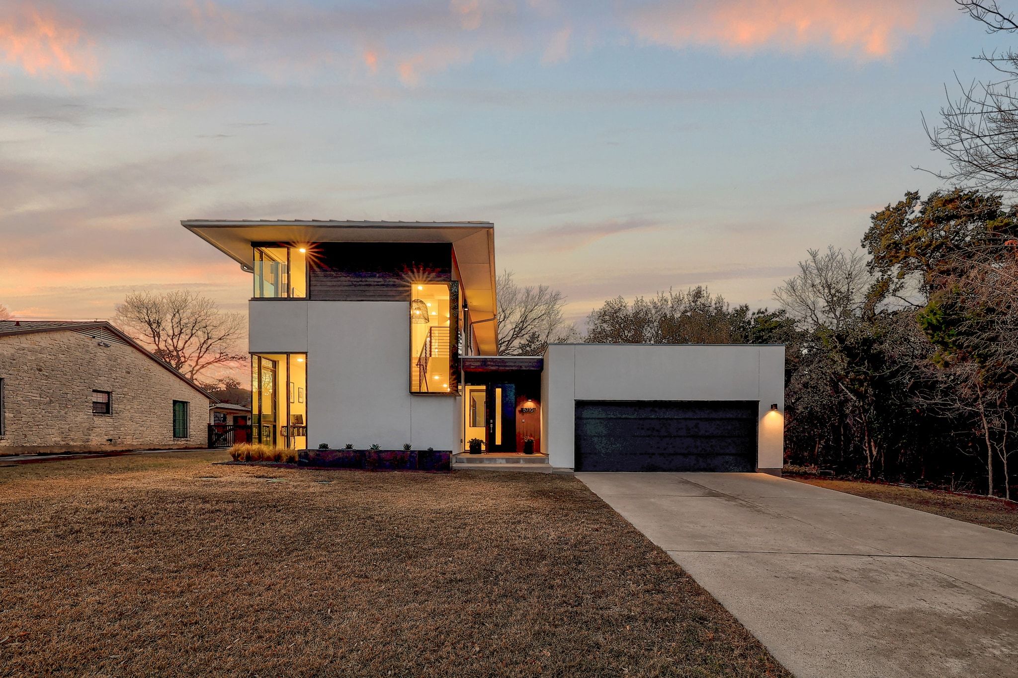 5710 Longhorn Landing Austin, TX 78734 - Photo 4 of 37 a front view of a house with a yard
