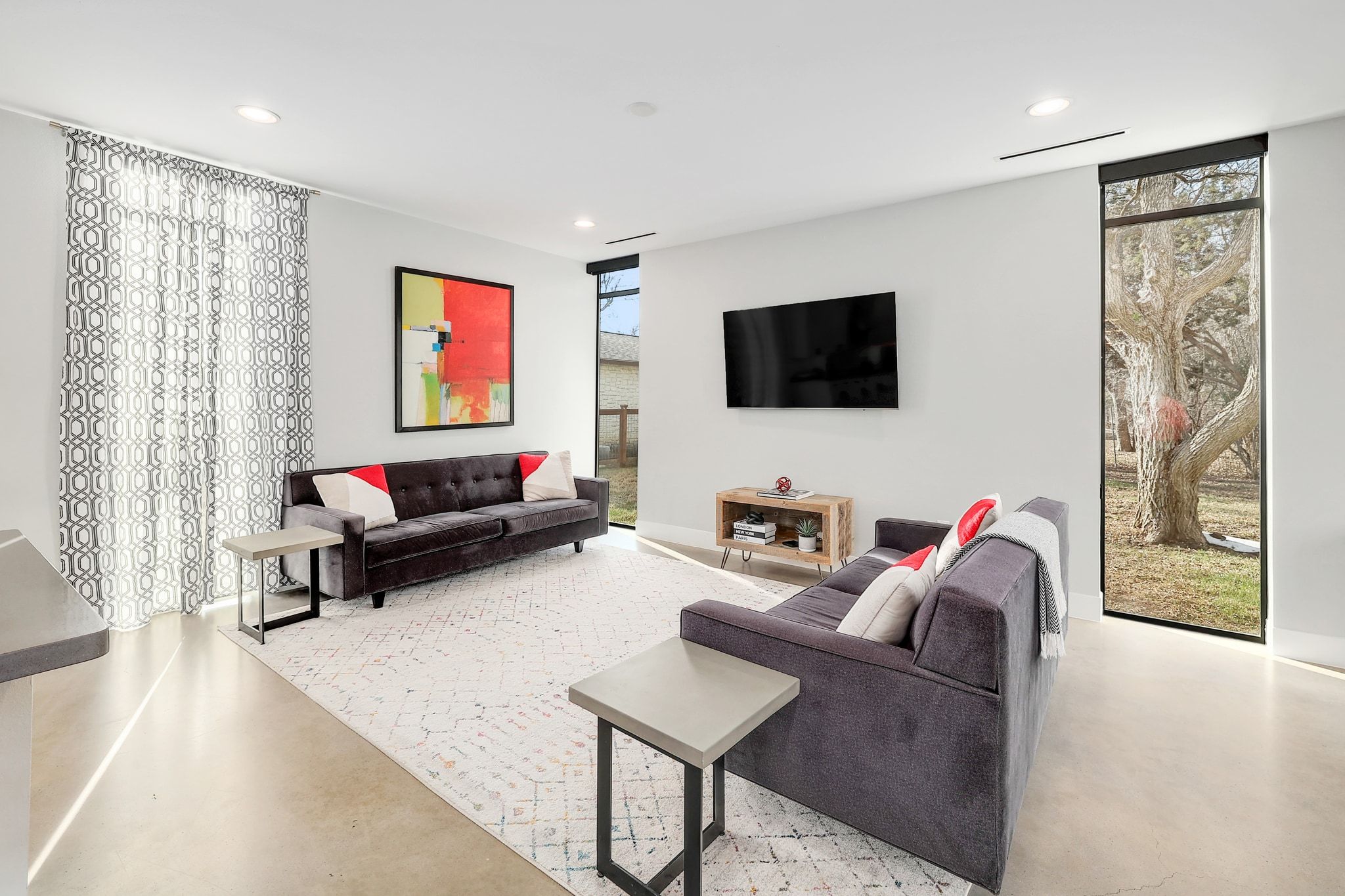 5710 Longhorn Landing Austin, TX 78734 - Photo 10 of 37 a living room with furniture and a flat screen tv
