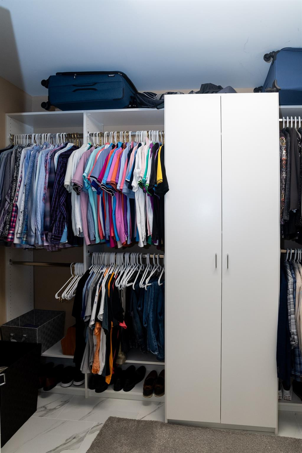 6192 Northwest 24th Street Boca Raton, FL 33434 - Photo 20 of 57 a view of walk in closet with clothes and shoes