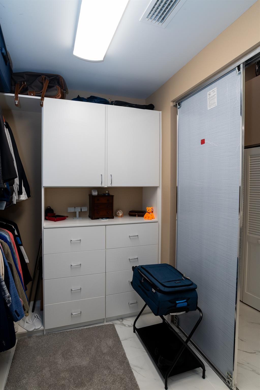 6192 Northwest 24th Street Boca Raton, FL 33434 - Photo 22 of 57 a room with storage and utility