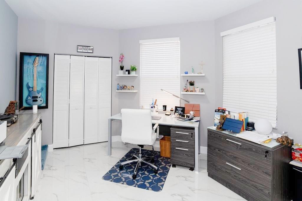 6192 Northwest 24th Street Boca Raton, FL 33434 - Photo 28 of 57 a workspace with furniture