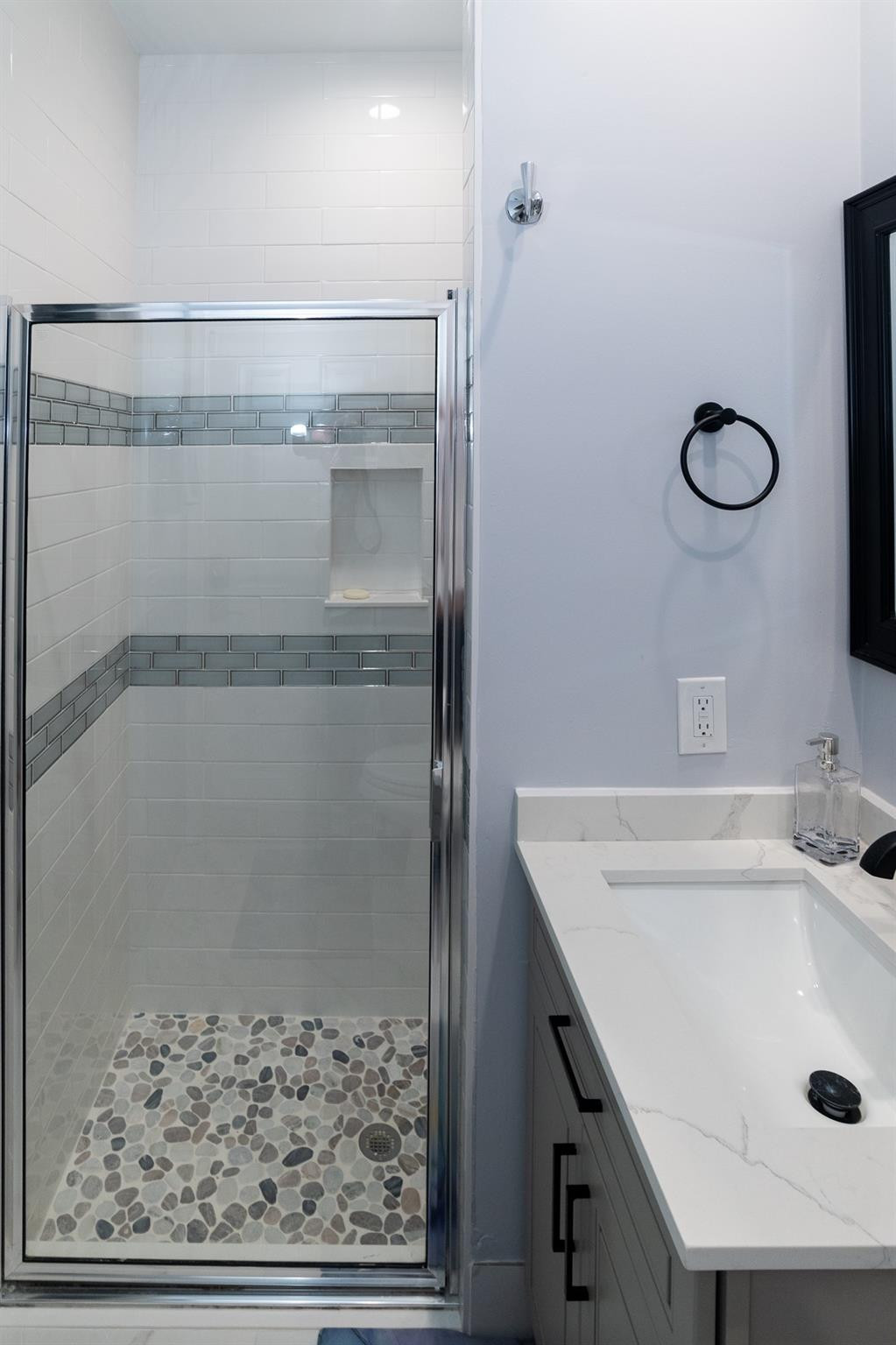 6192 Northwest 24th Street Boca Raton, FL 33434 - Photo 30 of 57 a bathroom with a sink and a mirror