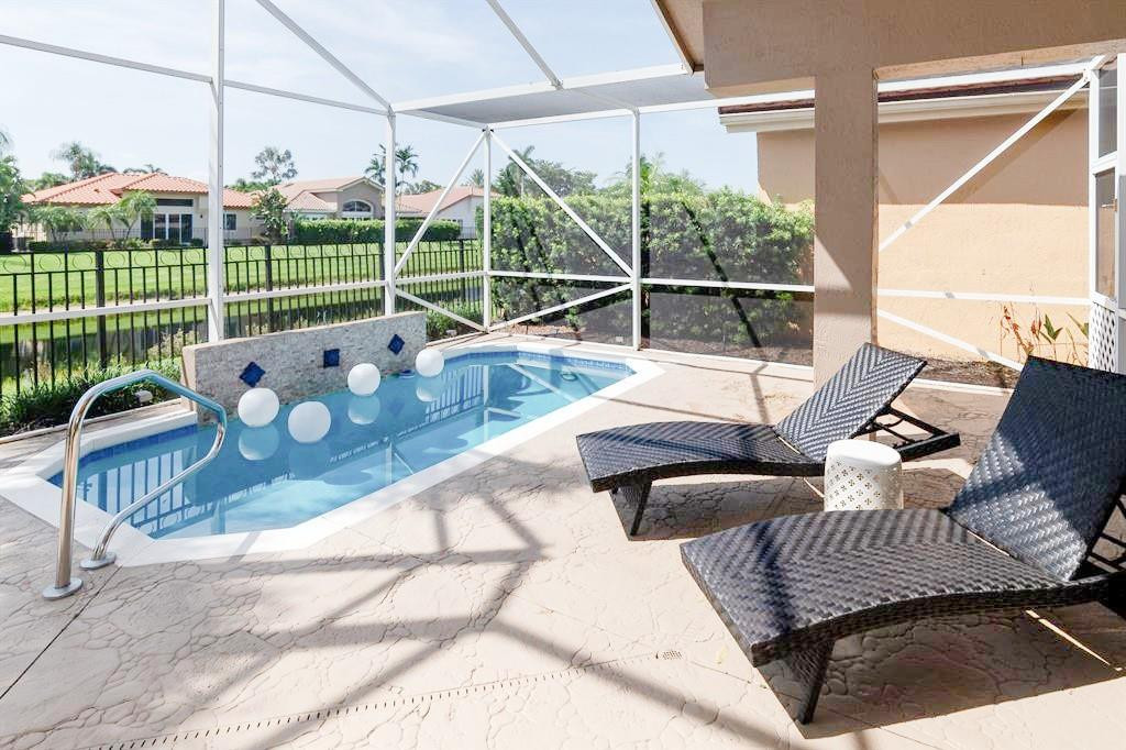 6192 Northwest 24th Street Boca Raton, FL 33434 - Photo 32 of 57 a view of a balcony with couch
