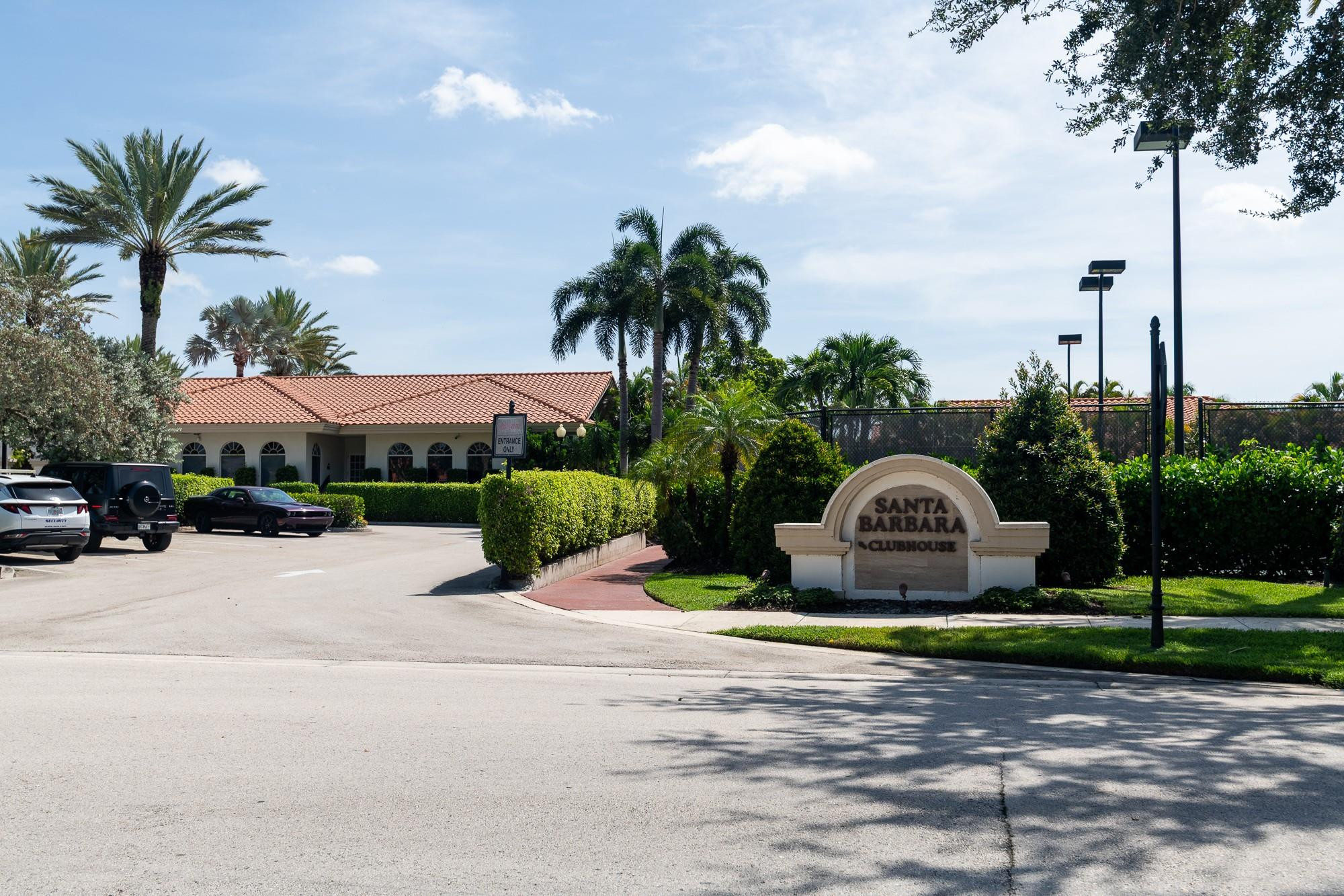 6192 Northwest 24th Street Boca Raton, FL 33434 - Photo 43 of 57 a view of a house with outdoor space and swimming pool