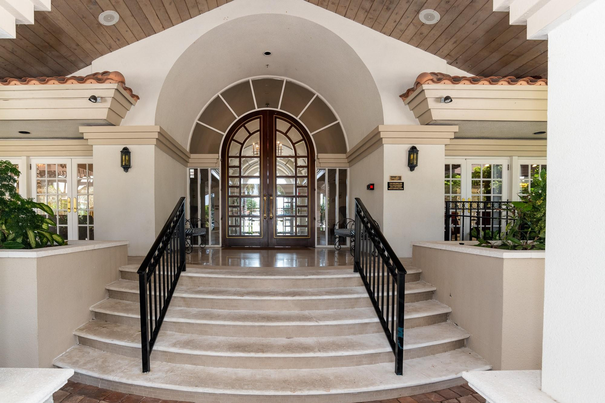 6192 Northwest 24th Street Boca Raton, FL 33434 - Photo 44 of 57 a view of entryway with a front door