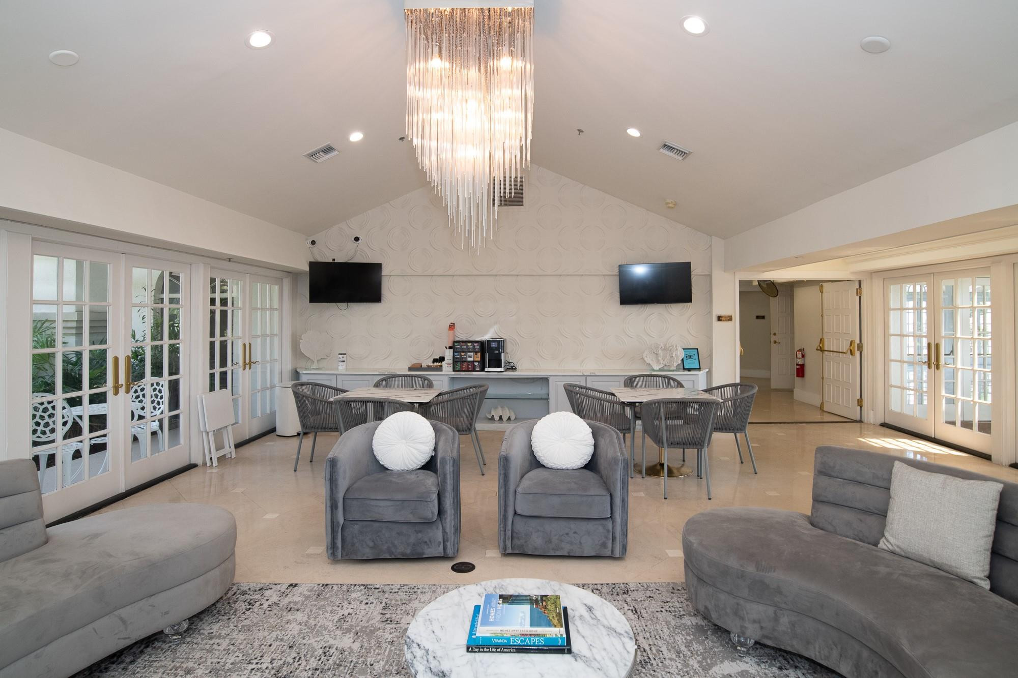 6192 Northwest 24th Street Boca Raton, FL 33434 - Photo 51 of 57 a living room with furniture and a large window