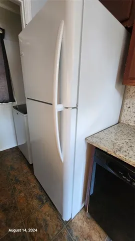 a view of living room washer and dryer