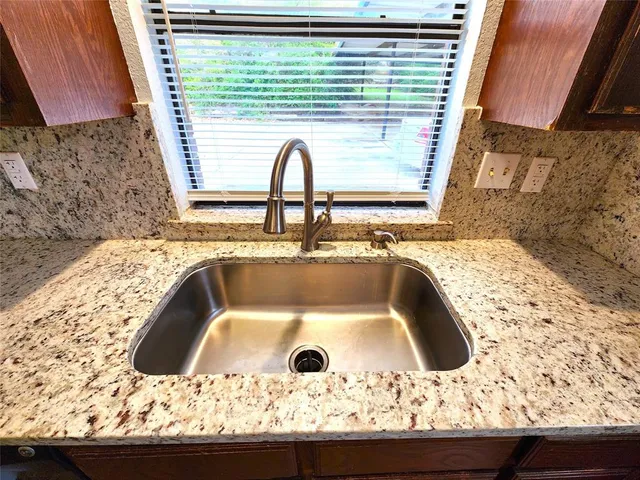 a view of a bathroom from a hallway