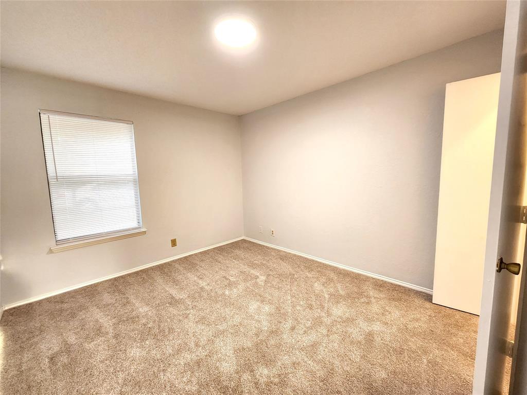 2202 Bolivar Street Denton, TX 76201 - Photo 27 of 36 an empty room with a window
