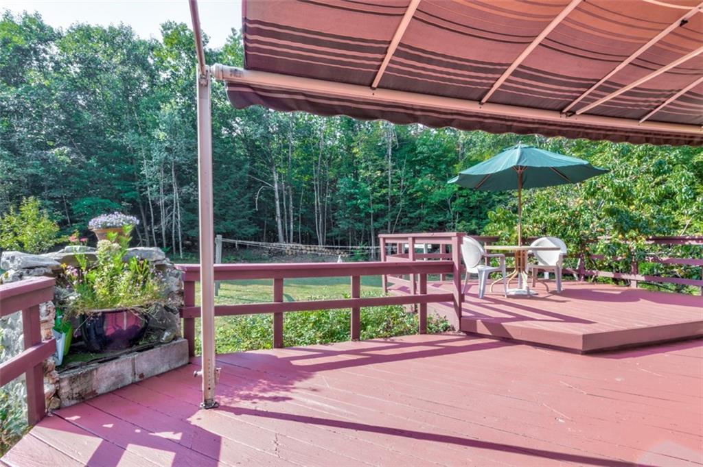 576 Brighton Hill Road Minot, ME 04258 - Photo 31 of 34 Private back yard and deck area with...