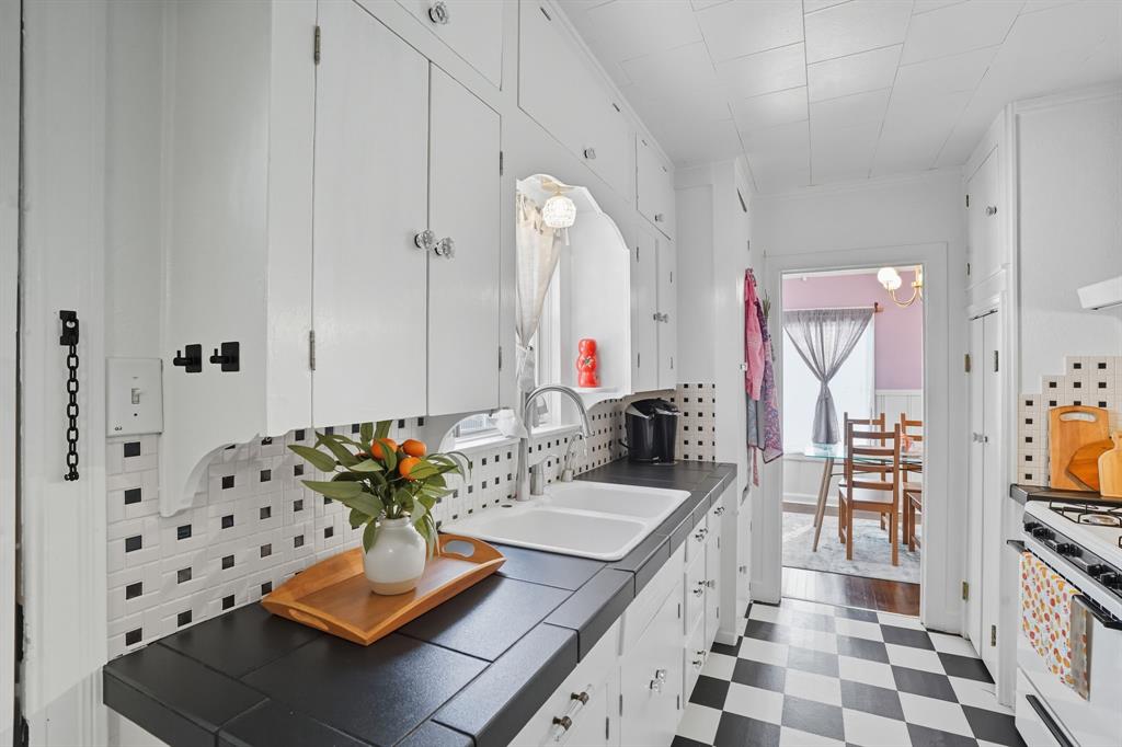 3244 Ryan Avenue Fort Worth, TX 76110 - Photo 16 of 31 a living room with furniture and wooden floor