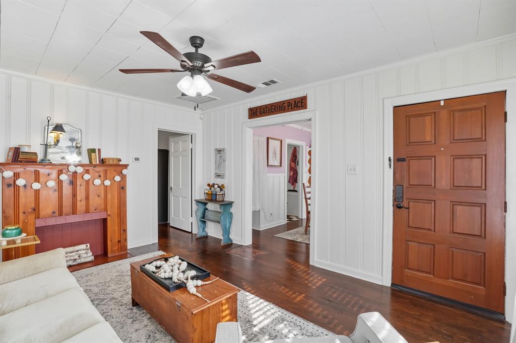 3244 Ryan Avenue Fort Worth, TX 76110 - Photo 7 of 31 a living room with furniture and wooden floor