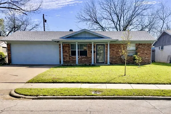 a house with trees in the background