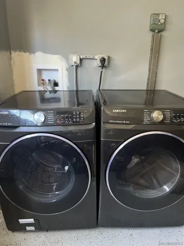 a utility room with a washer and dryer