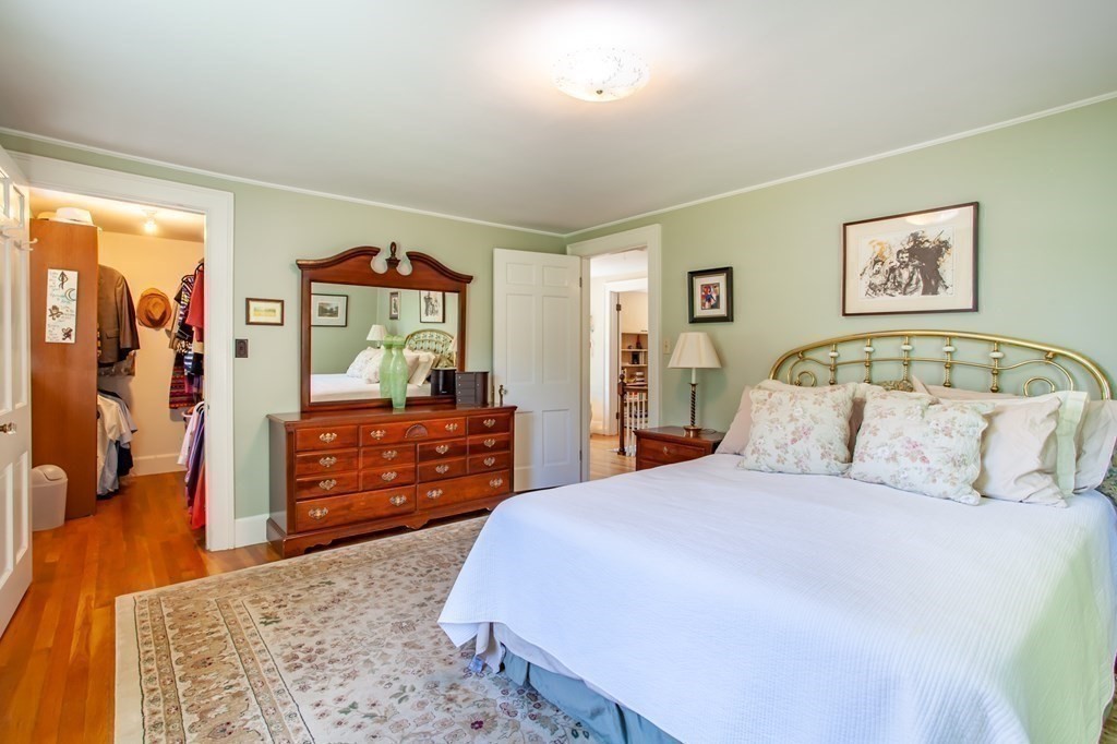 63 Dalton Road Chelmsford, MA 01824 - Photo 13 of 27 a bedroom with a bed and a dresser