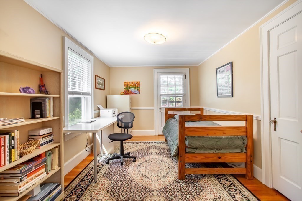 63 Dalton Road Chelmsford, MA 01824 - Photo 17 of 27 a bedroom with furniture and a window