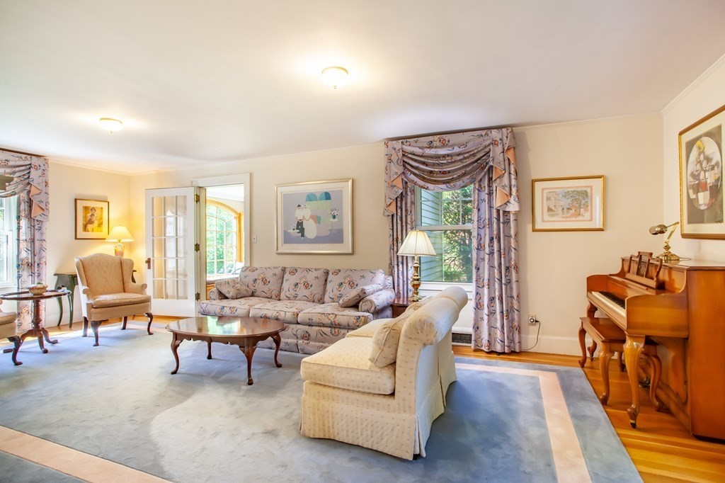 63 Dalton Road Chelmsford, MA 01824 - Photo 8 of 27 a living room with furniture and a window