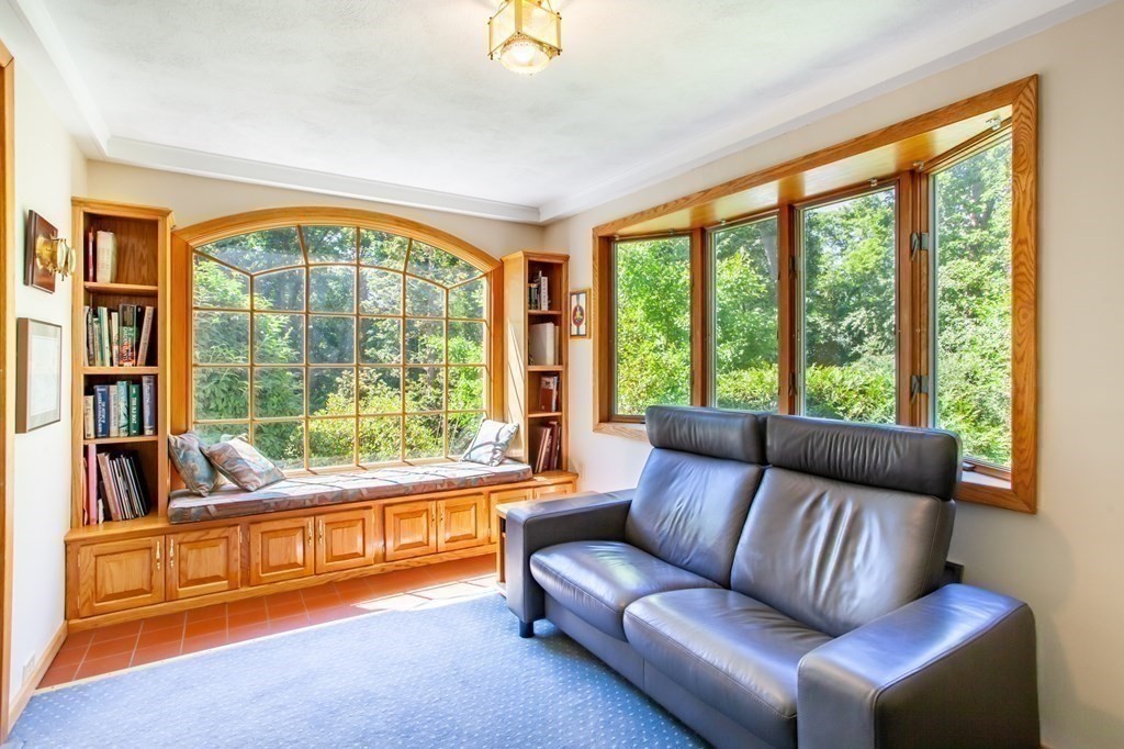 63 Dalton Road Chelmsford, MA 01824 - Photo 9 of 27 a living room with furniture and a large window