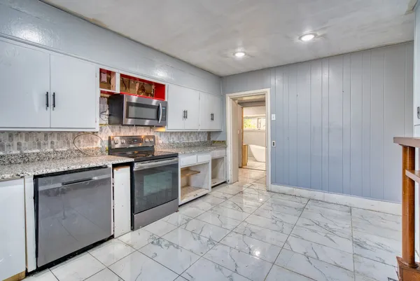 a view of storage and utility room