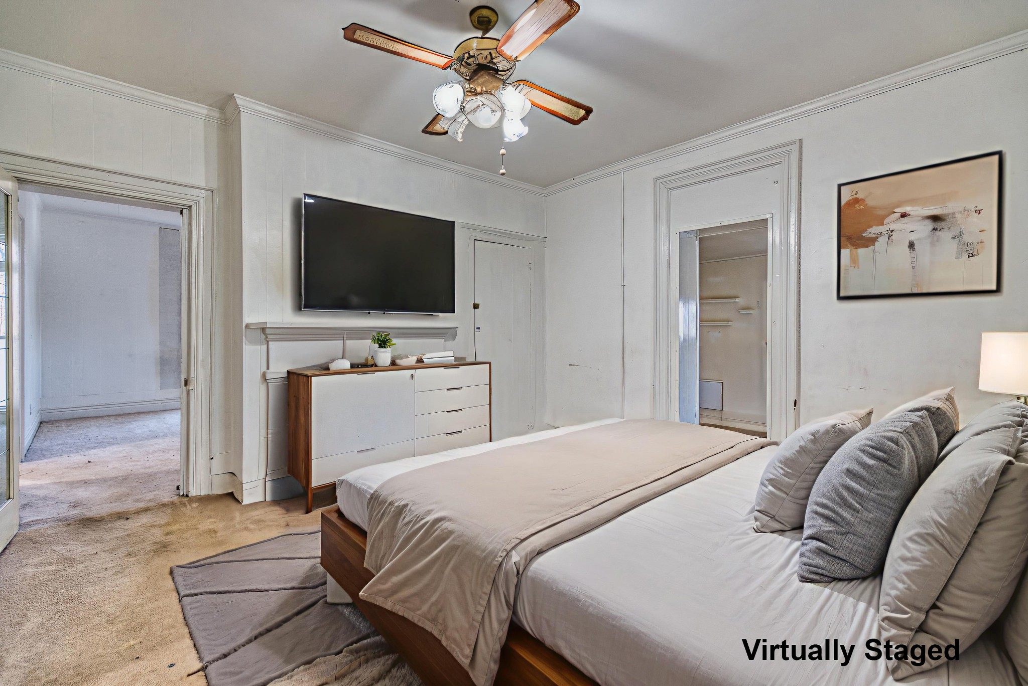 62 North Main Street Springfield, TN 37172 - Photo 29 of 69 a bedroom with a large bed and a flat screen tv