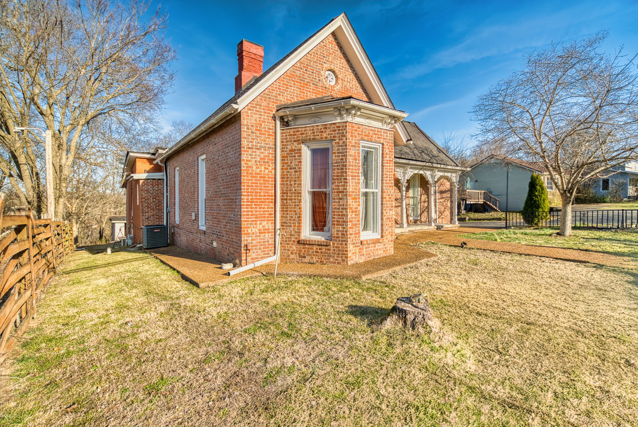 62 North Main Street Springfield, TN 37172 - Photo 3 of 69 a front view of a house with a yard