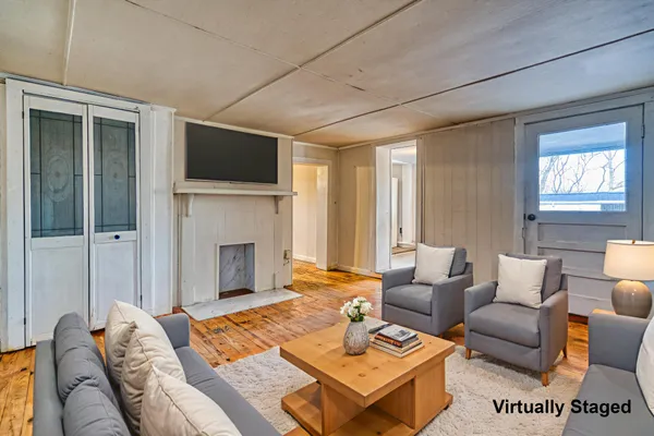 a view of a chairs in front of a house