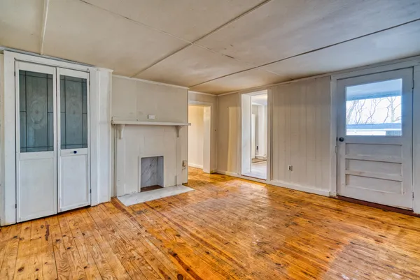 a aerial view of a house with a yard