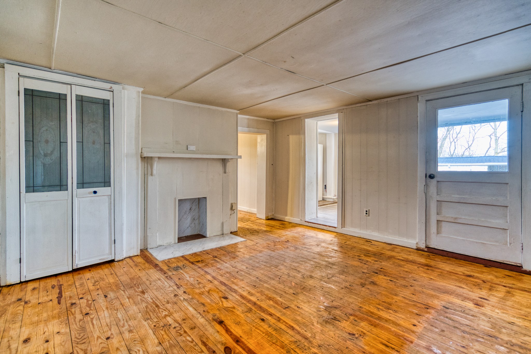 62 North Main Street Springfield, TN 37172 - Photo 49 of 69 a view of an empty room with a fireplace and a window