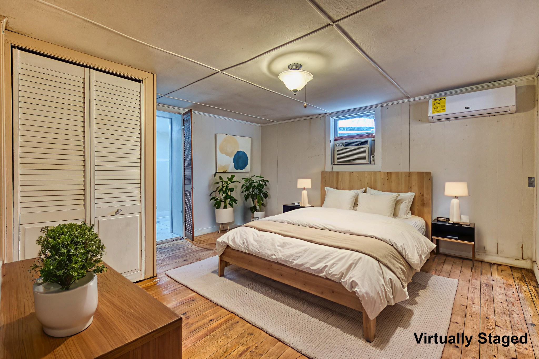 62 North Main Street Springfield, TN 37172 - Photo 56 of 69 a bedroom with a bed and a potted plant