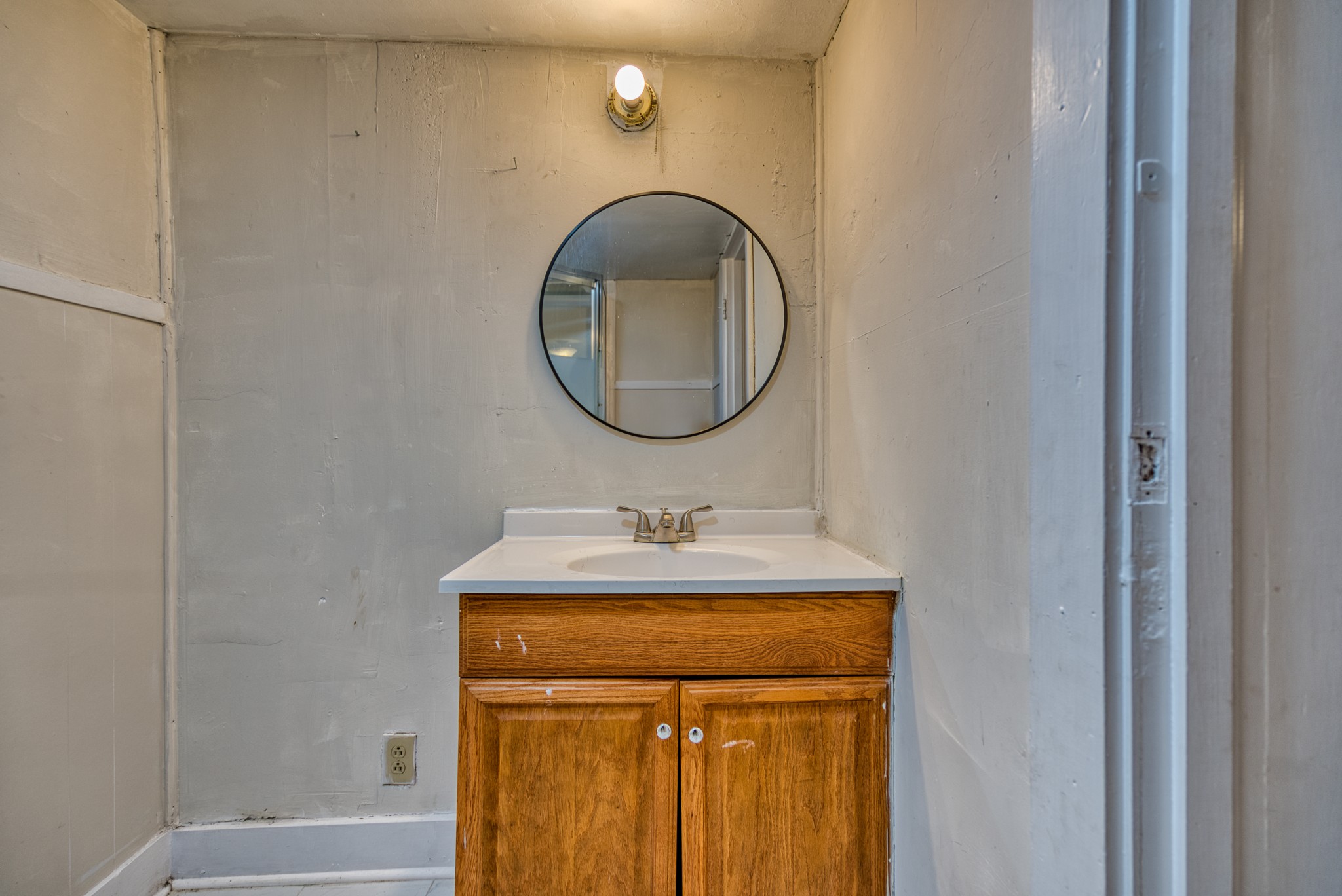 62 North Main Street Springfield, TN 37172 - Photo 61 of 69 a bathroom with a sink and a mirror