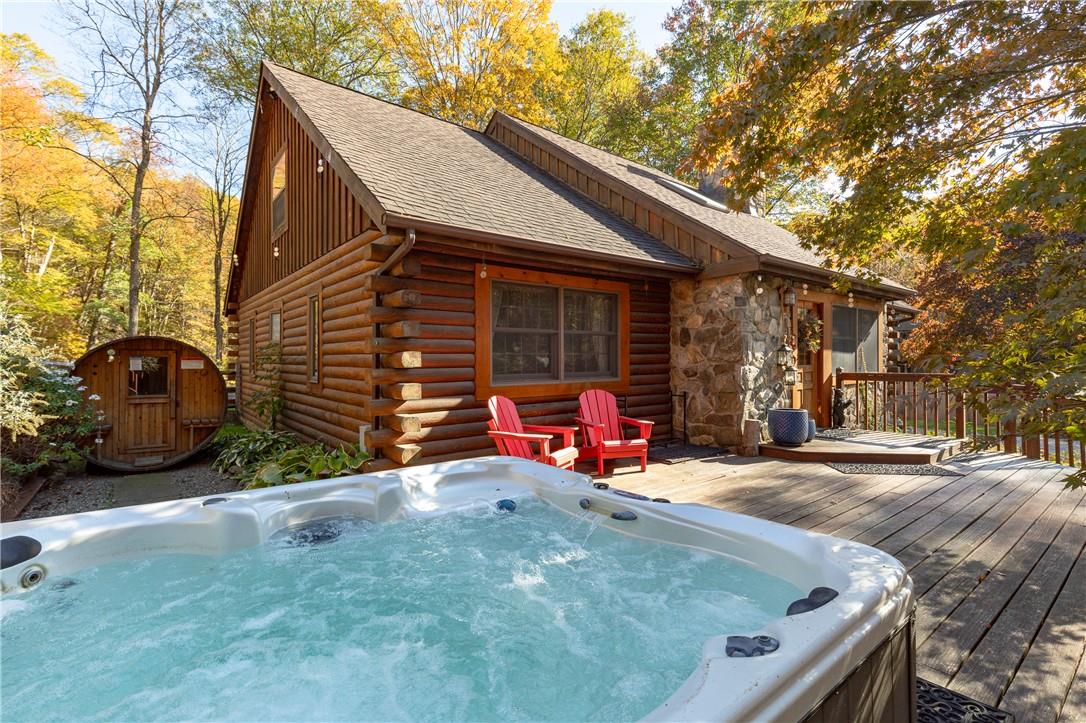 188 Old Albany Post Road Garrison, NY 10524 - Photo 1 of 1 a view of a chair and table in the back yard of the house