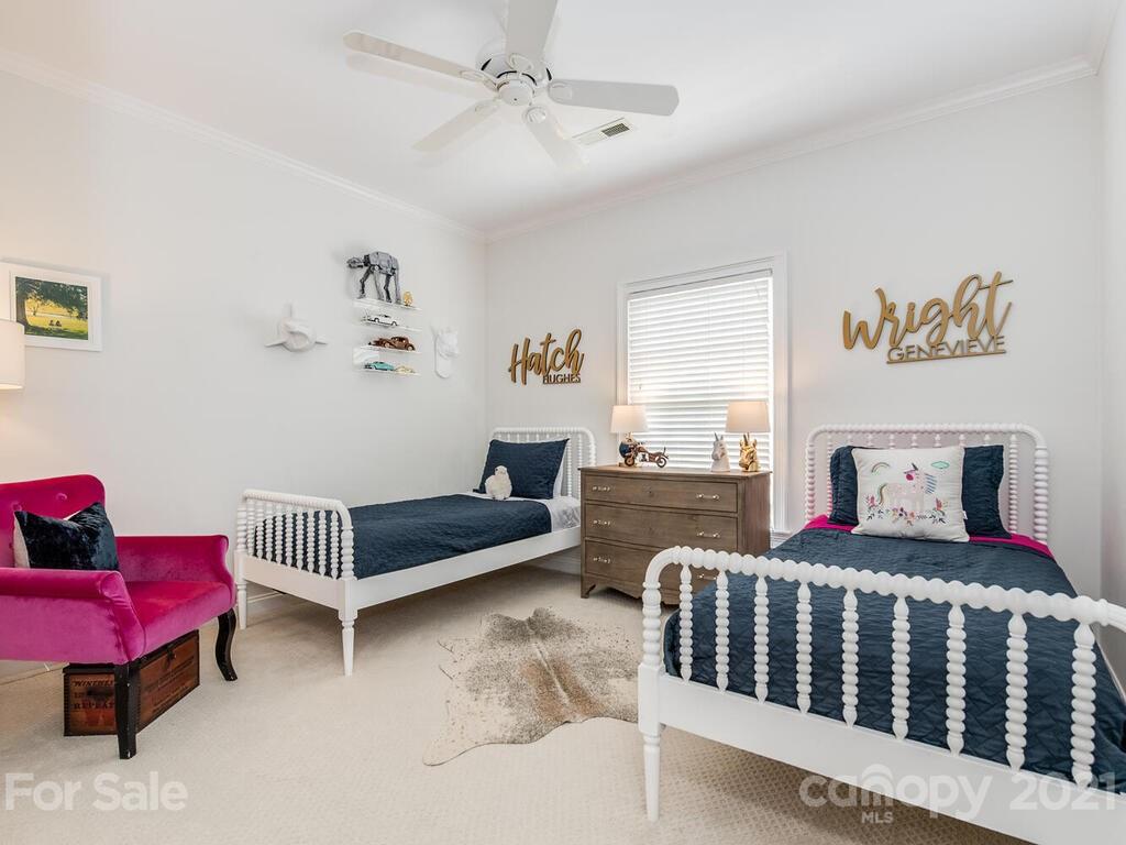 3025 Sharon Road Charlotte, NC 28211 - Photo 20 of 32 a bedroom with furniture and a window
