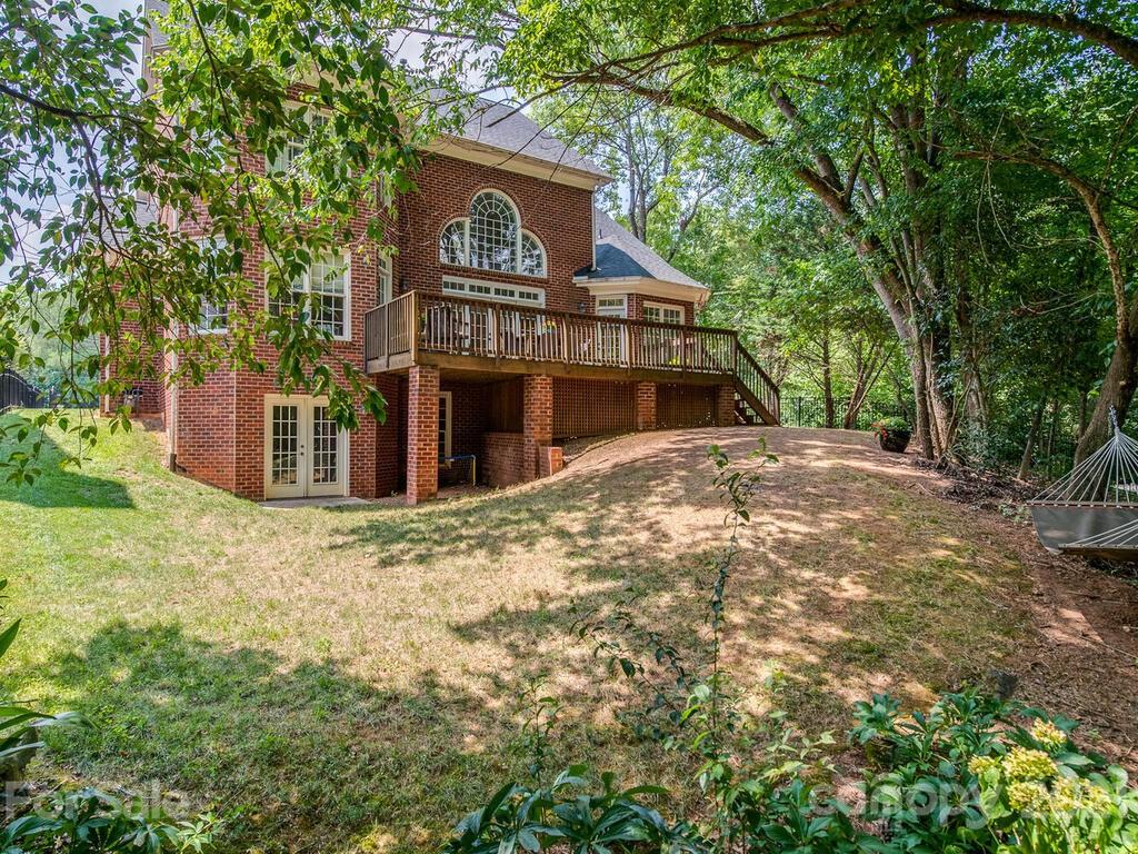 3025 Sharon Road Charlotte, NC 28211 - Photo 31 of 32 a view of a house with a yard