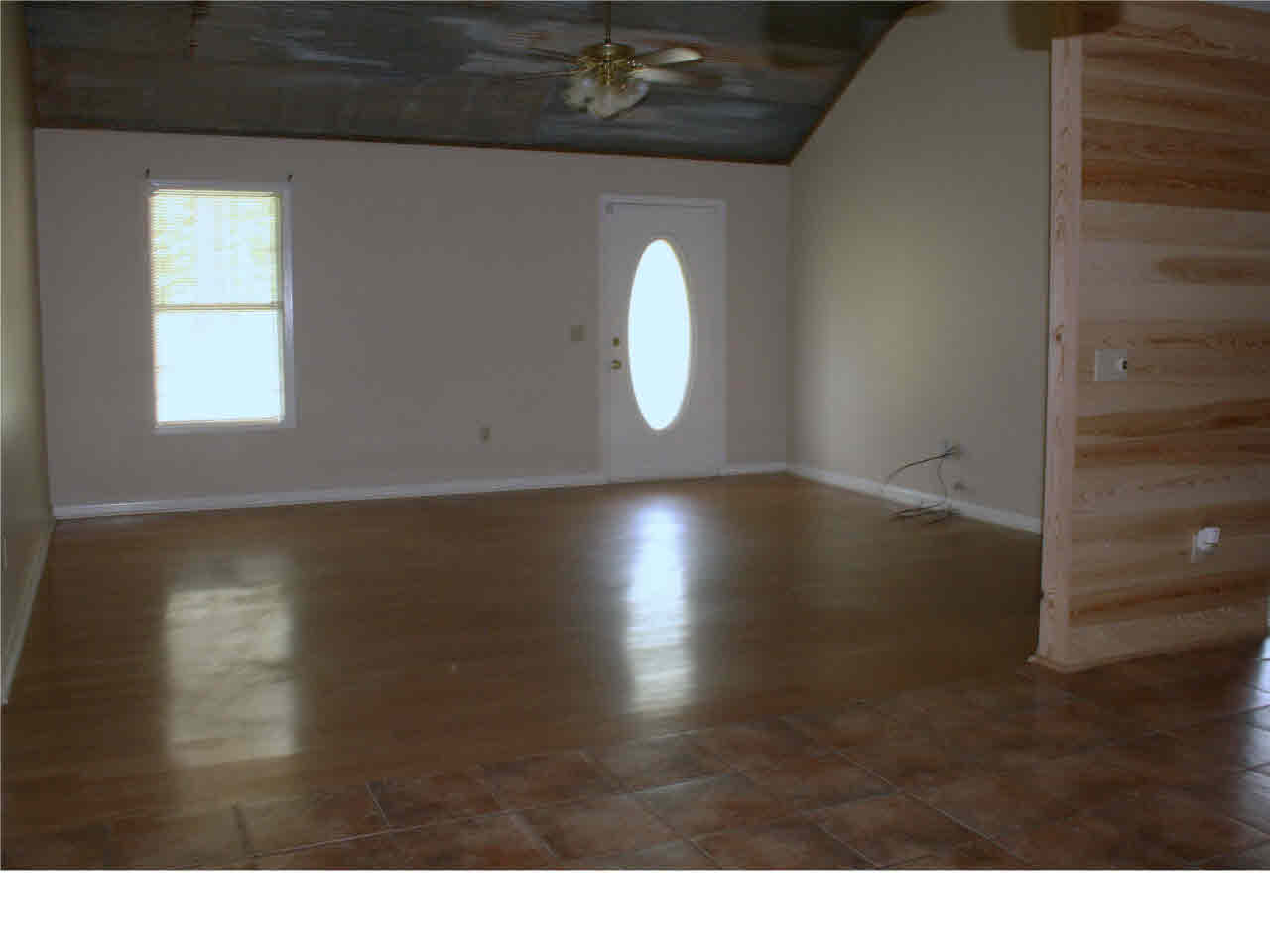 160 Hill Top Road Harrisville, MS 39082 - Photo 6 of 23 Living room view from dining area.