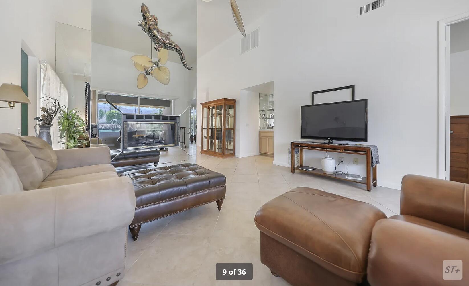 141 Lakeshore Drive Rancho Mirage, CA 92270 - Photo 11 of 34 a living room with furniture and a flat screen tv