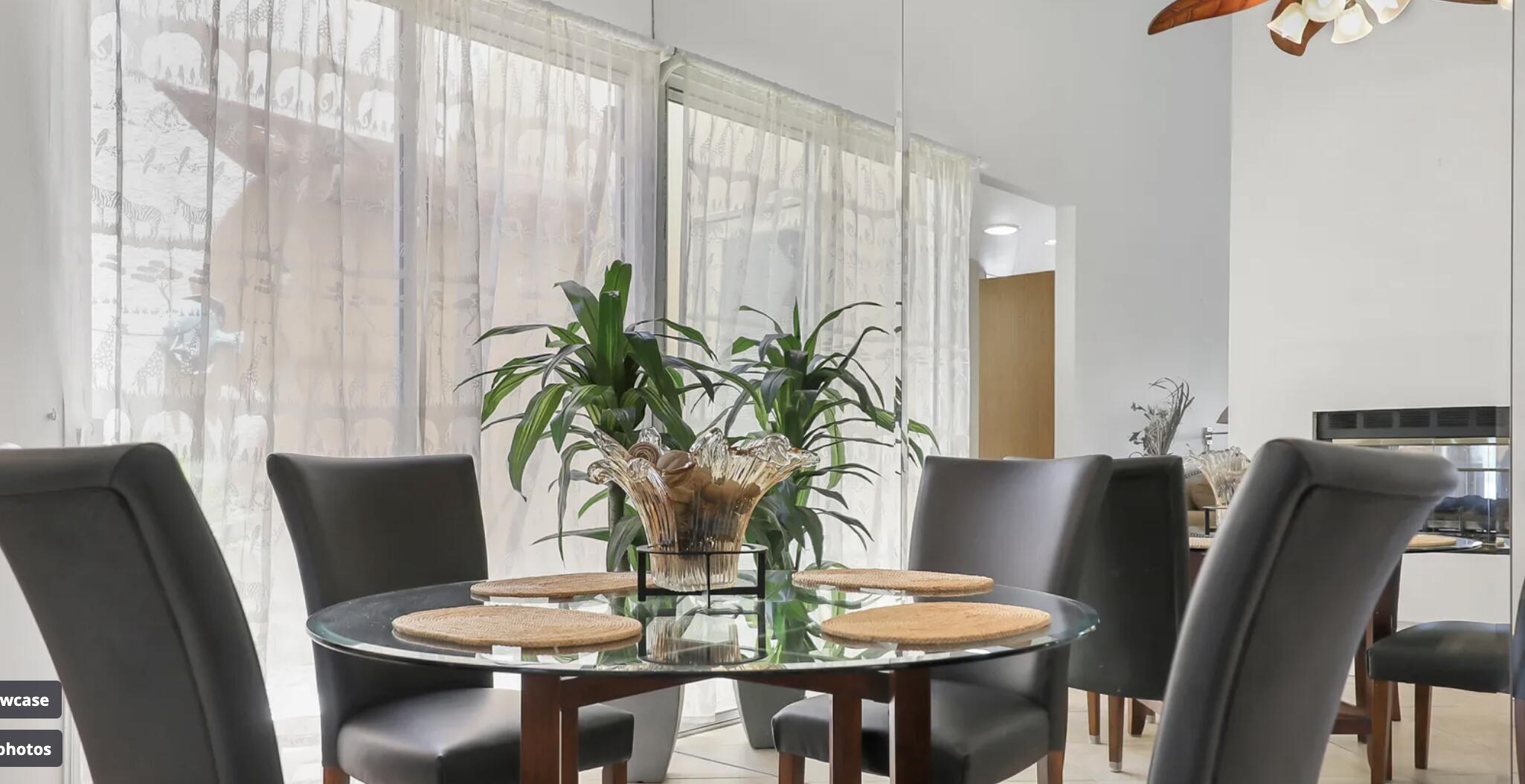 141 Lakeshore Drive Rancho Mirage, CA 92270 - Photo 12 of 34 a view of a dining room with furniture window and wooden floor