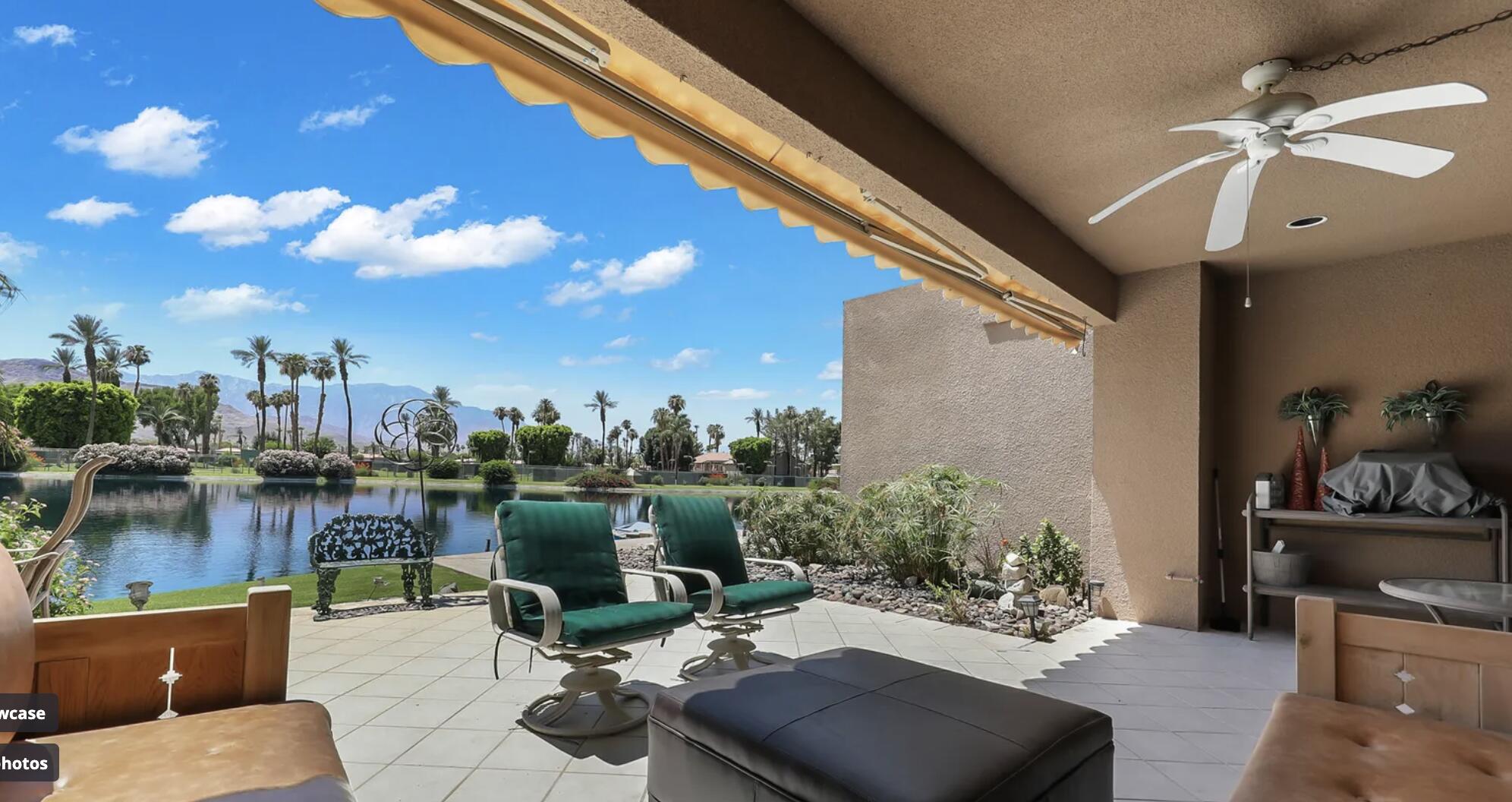 141 Lakeshore Drive Rancho Mirage, CA 92270 - Photo 2 of 34 a view of a terrace with furniture and lake view