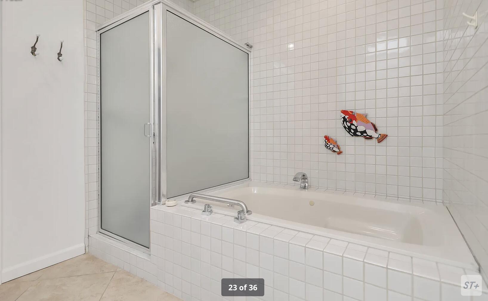 141 Lakeshore Drive Rancho Mirage, CA 92270 - Photo 26 of 34 a bathroom with a bathtub and a shower